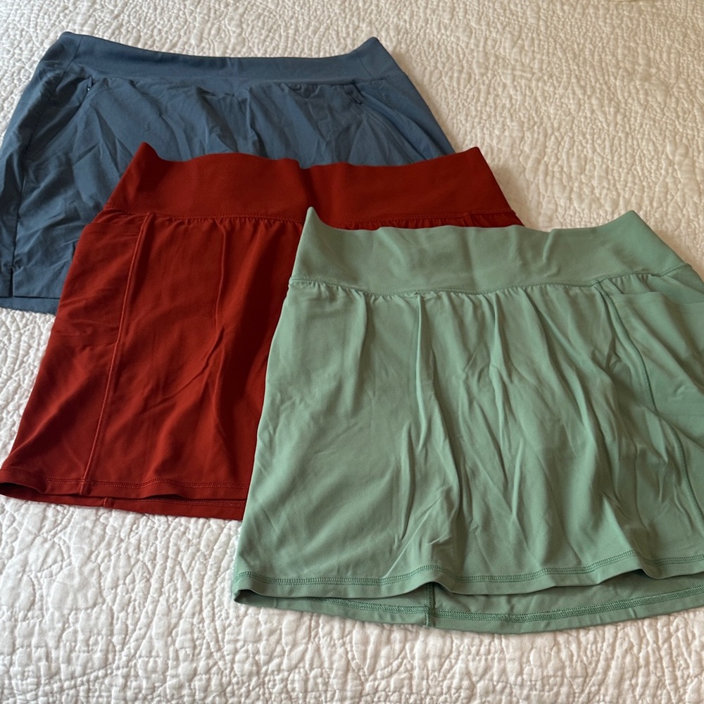 Athleta Set of Three Skorts in Blue, Rust, and Green - L